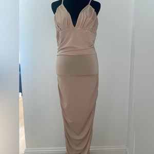 Women Crinkle Halter V Neck Sexy Backless slinky design and ruched detailing.